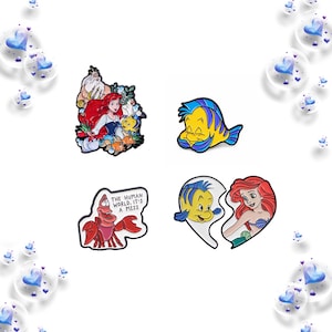May include: Four enamel pins featuring characters from a popular animated film. One pin shows Ariel with Flounder and Sebastian. Another shows Flounder. A third pin features Sebastian with the text "The human world, it's a mess." The last pin shows Ariel and Flounder in a heart shape.
