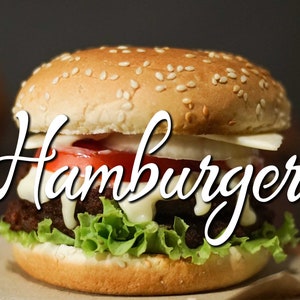 May include: A hamburger with a sesame seed bun, lettuce, tomato, onion, cheese, and a creamy sauce. The word "Hamburger" is written in a cursive font across the image.
