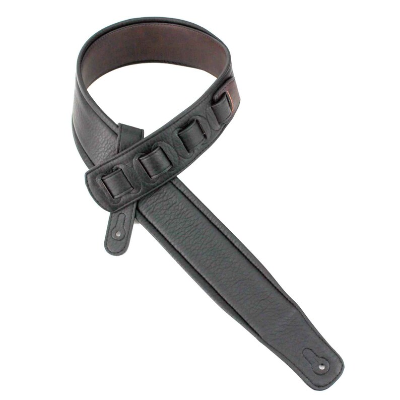 Puede incluir: Correa de guitarra de cuero negro con detalles en cuero marr&oacute;n y cierre de hebilla. La correa tiene una superficie texturizada y est&aacute; dise&ntilde;ada para la comodidad.