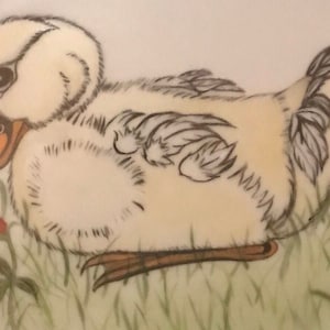 A young duckling hand painted on a decorative plate