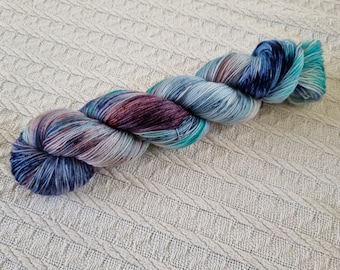 Wobbly Whale 2022: Handdyed Merino superwash fingering weight sock yarn.