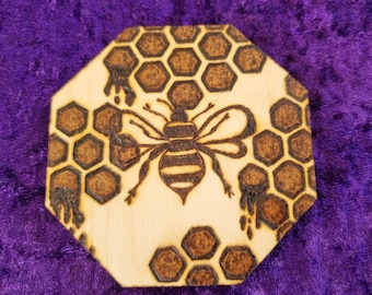 Bee and honeycomb burned on birch wood coaster