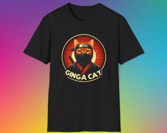 May include: Black t-shirt with a graphic of a cat wearing a ninja mask and holding a sword. The graphic is surrounded by a red and yellow circle with the text "Ginga Cat".