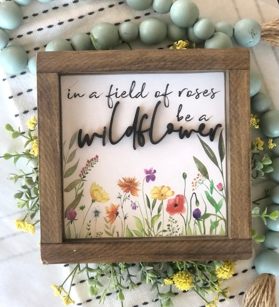 In a Field of Roses, she is a Wildflower | 13x35 inch Wood Sign