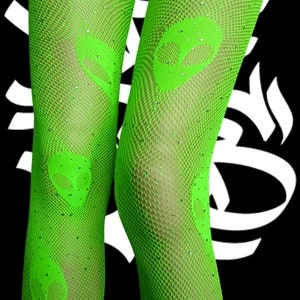 May include: Green fishnet stockings with alien head designs and rhinestones.