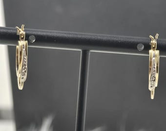 Boucles d'oreilles créoles ovales en or jaune et blanc 14 carats avec diamants