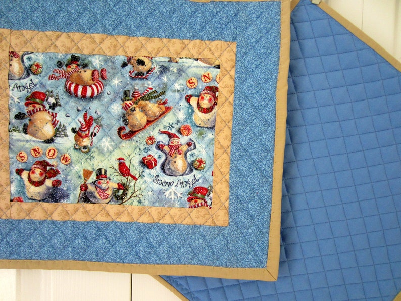 Set of Four Christmas Snowmen Quilted Placemats Blue and Tan Sledding