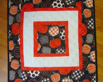 19" Quilted Square Halloween Orange and Black Patterned Pumpkins with Multiple Borders and Double Cross Hatch Quilting Table Topper