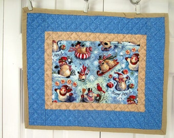 Set of Four Christmas Snowmen Quilted Placemats; Blue and Tan Sledding Snowmen Place Mats; Holiday Table Placemats