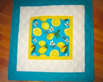 20" Quilted Square Bright Yellow Lemons Floating on a Background of Blue Turquoise and Double Cross Hatch Diagonal Quilting Table Topper