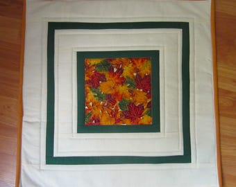 18.75" Quilted Square Fall Autumn Leaves of Oranges, Greens and Browns with Multiple Borders of Dark Green and Cream Table Topper