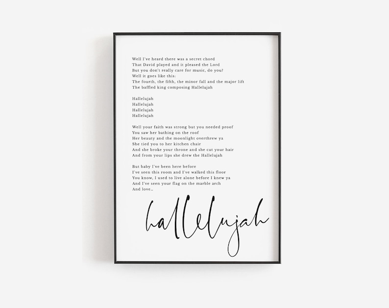 May include: Black and white printable wall art featuring the lyrics to the song "Hallelujah" by Leonard Cohen. The lyrics are printed in a simple, elegant font and the word "Hallelujah" is written in a large, bold font at the bottom of the page.