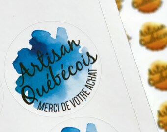 May include: Blue and white round stickers with the text "Artisan Québécois" and "Merci de votre achat".
