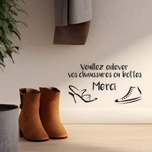 May include: A black and white vinyl sticker with the text "Veuillez enlever vos chaussures ou bottes Merci" and illustrations of a shoe and a boot.