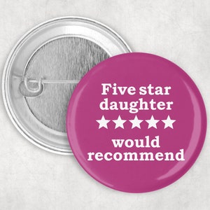 May include: A pink button with white text that reads "Five star daughter would recommend" and five white stars.