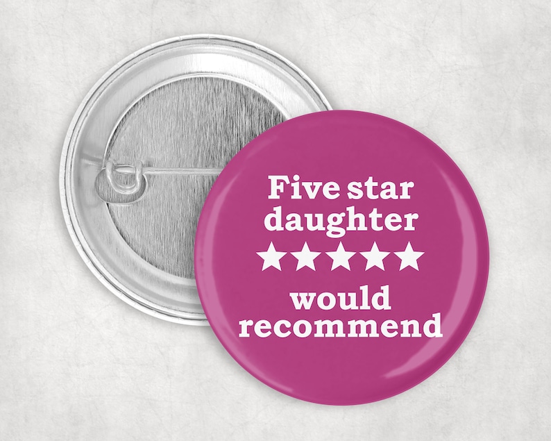 May include: A pink button with white text that reads "Five star daughter would recommend" and five white stars.