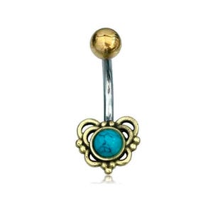 May include: A gold belly button ring with a turquoise stone set in a heart-shaped design.