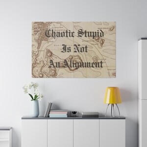 May include: A vintage-style map with the text "Chaotic Stupid Is Not An Alignment" printed on it. The map is in shades of brown and beige.