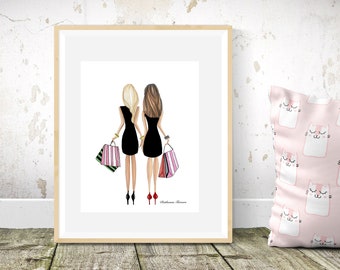 May include: An art print of two women in black dresses holding shopping bags. One woman has blonde hair and the other has brown hair. The print is in a wooden frame, with a pink cat-themed pillow in the background.