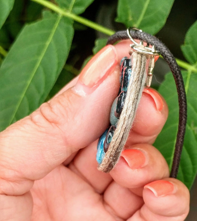 Many phases of Luna pendant