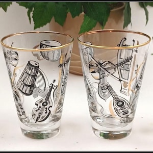 Juego de 4 vasos altos Libbey MCM de la década de 1950, instrumentos musicales negros y dorados