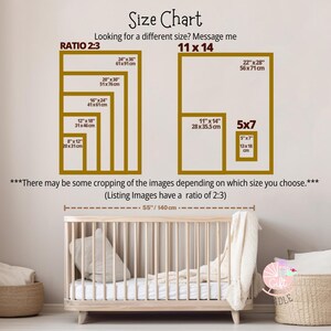 a baby crib with a size chart on the wall