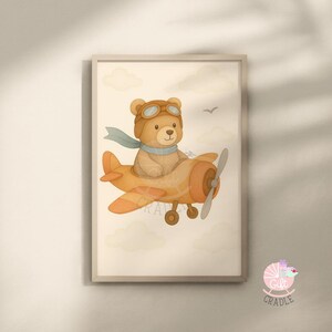 a picture of a teddy bear flying on an airplane