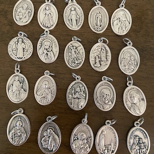 Saint Medal: ADD ON to your rosary or bracelet order. Only with a purchase of a Rosary or bracelet.