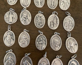 Saint Medal: ADD ON to your rosary or bracelet order. Only with a purchase of a Rosary or bracelet.