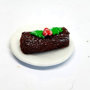 Tronco de chocolate de natal para casa de bonecas