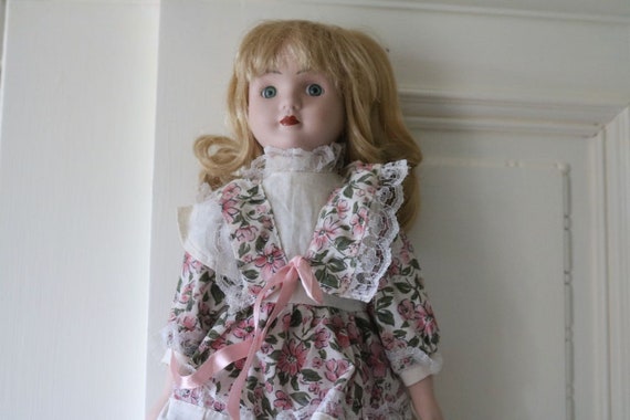 porcelain doll cabinet