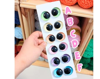 Ojos de seguridad arcoíris brillantes con aspecto descentrado – EN71 – 16–40 mm – Ojos de peluche y crochet