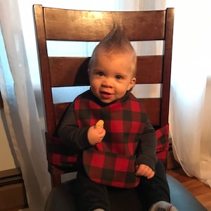 Silla alta de envoltura portátil