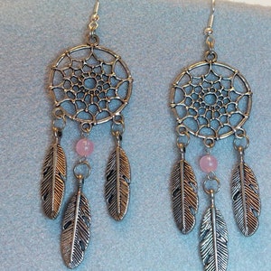 Dream Catcher Dangle Earrings Pink or Purple Bead Metal alloy Feathers Music Festival Bohoo Style All dreams come true and pass through with Pink Bead