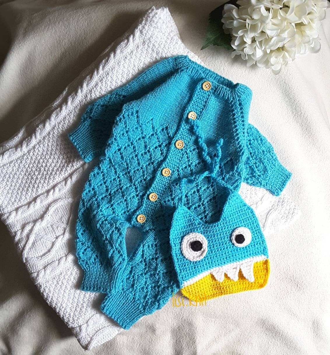 Knitted baby wool romper. Knitted baby clothes. Baby knit