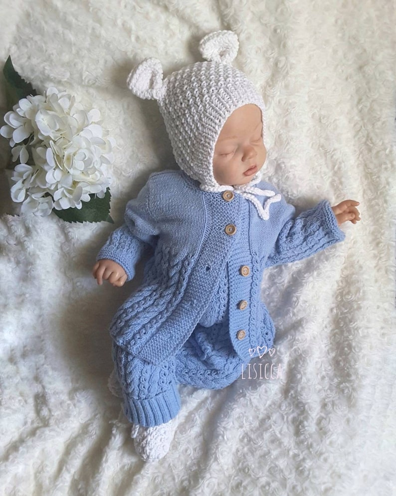 blue knitted baby outfit