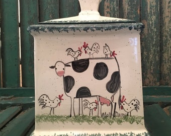 Cookie Jar - Hand painted cookie jar by Molly Dallas with cow and chickens around it.  Choose from 8 different spatter colors.