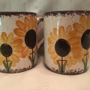 This sunflower coffee mug will add some happiness to your morning!  This is brown spatter, but I can spatter it in any color.