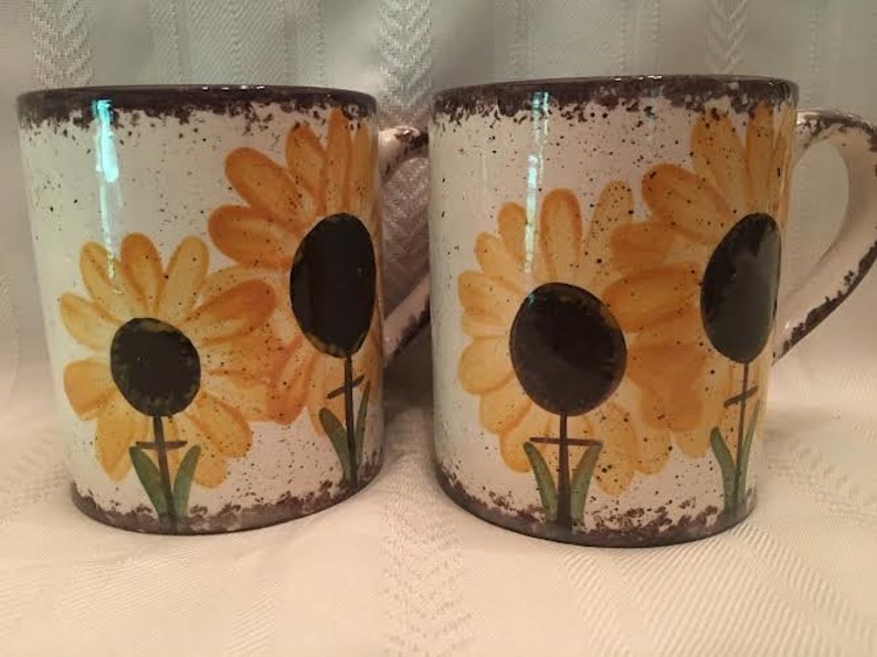 This sunflower coffee mug will add some happiness to your morning!  This is brown spatter, but I can spatter it in any color.