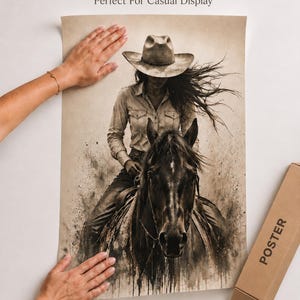 May include: A sepia-toned poster featuring a person wearing a cowboy hat and long-sleeved shirt riding a horse. The artwork has a distressed, ink-splattered aesthetic. The text 'Ink Jet Based Printing' and 'Perfect For Casual Display' appears above.