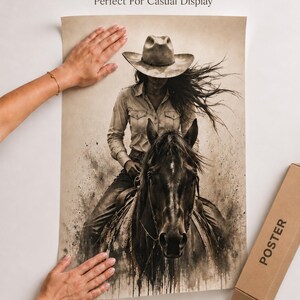 May include: A sepia-toned poster featuring a person wearing a cowboy hat and long-sleeved shirt riding a horse. The artwork has a distressed, ink-splattered aesthetic. The text 'Ink Jet Based Printing' and 'Perfect For Casual Display' appears above.