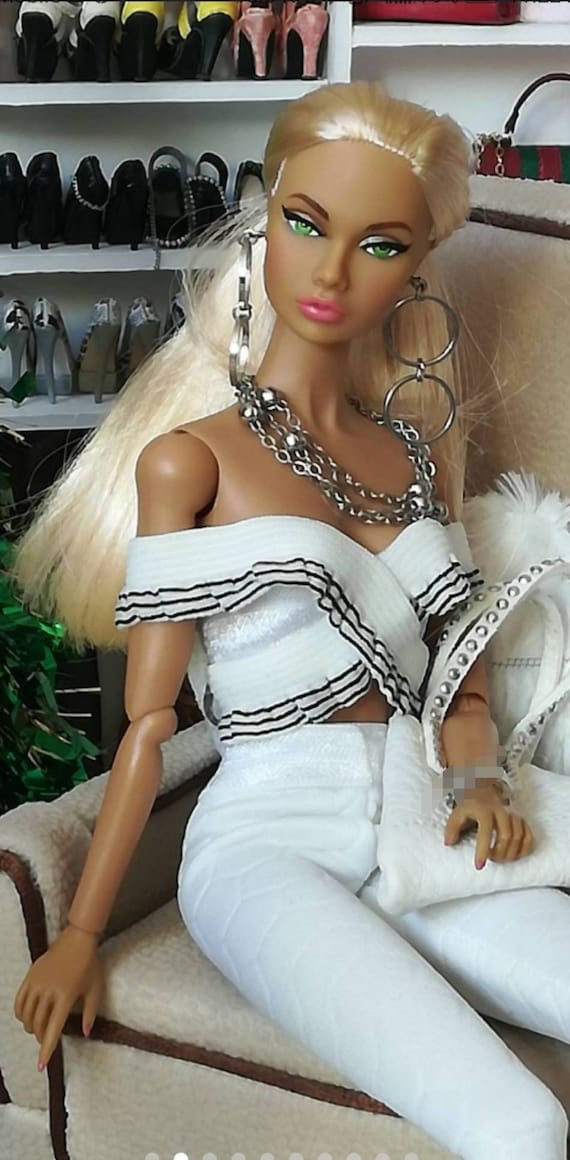 Barbie made to move doll with best sale fashion accessories