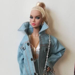 12 inch doll jacket fit all same size doll.