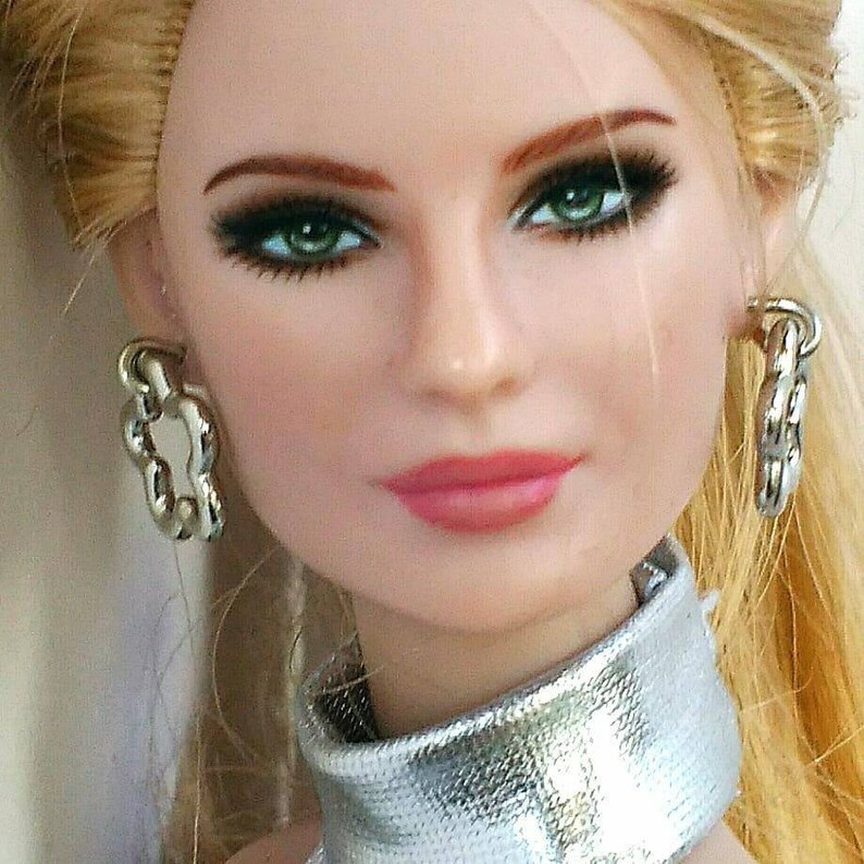 Fashion Doll earrings one size fits all same size doll!