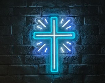 May include: A blue neon cross with white outlines and a white starburst effect behind it. The cross is mounted on a brick wall. SIZE: 30*22cm/40*29cm
