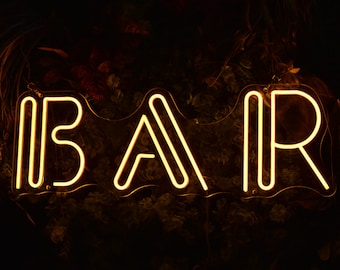 May include: A neon sign that reads "BAR" in yellow. The sign is 12 inches, 15 inches, 19 inches, 24 inches, or 36 inches tall.