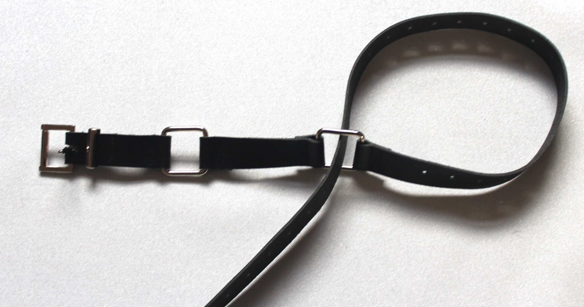 Leather handcuff belt. Use as a normal belt or turn it