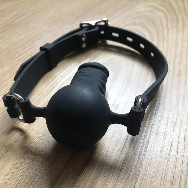 Penis gag silicone lockable bdsm gear for submissive women and men. Dildo mouth penetration gag. Vegan. PU, silicone or real leather strap.