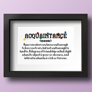 May include: A black framed print with a white background and the word "ACQUAINTANCE" in black letters with colorful push pins. The definition of the word is written in black text below.