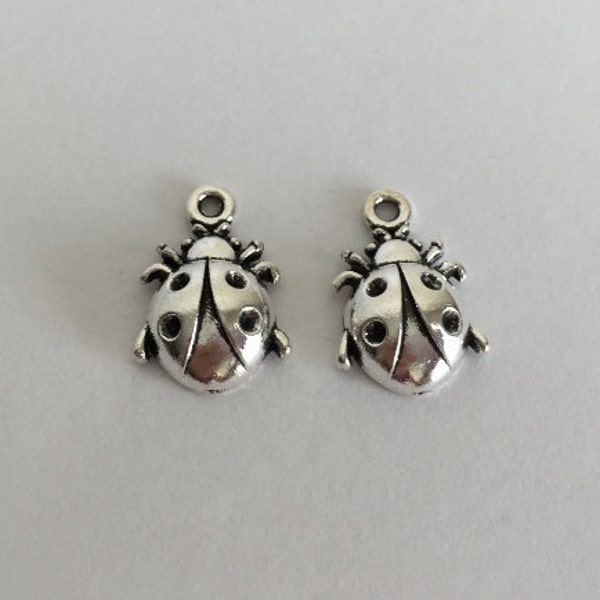 Small Antique Silver Finished Ladybug Pendant. Small Ladybug Charm. Wholesale Craft Supplies. DIY Craft Supplies. Charm Wholesaler.